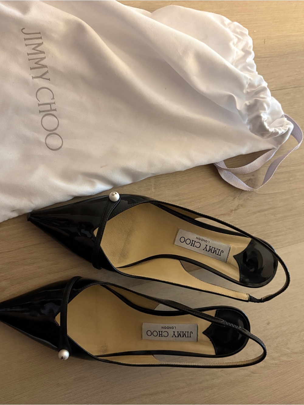 Jimmy Choo Black Patent Leather Pointed Slingback Pumps with Pearl Accent
